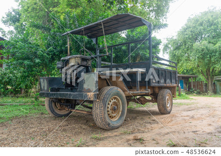 Abandoned car in countryside Abandoned car in countryside 48536624