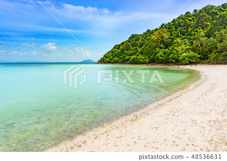 Blue sea and white sand beach with moutain Blue sea and white sand beach with moutain 48536631