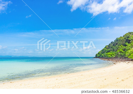 Blue sea and white sand beach with moutain Blue sea and white sand beach with moutain 48536632