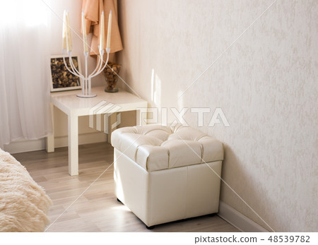 Interior and decor concept - vintage candlestick in the bedroom Interior and decor concept - vintage candlestick in the bedroom 48539782