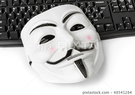 Computer hacker mask and keyboard 48541284