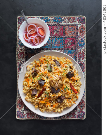 Lamb pilaf with rice. Asian cuisine. Top view. 48542003