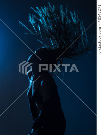 woman afro pigtails raincoat dance floor lights woman afro pigtails raincoat dance floor lights 48542271