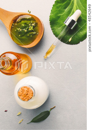 Natural cosmetics, oils for skin care on a light background. Homeopathic oils, whey, milk, soap 48542649