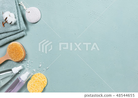Bath accessories on the light blue background Bath accessories on the light blue background 48544655