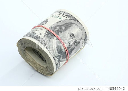 Many dollar banknotes on white background. National American currency Many dollar banknotes on white background. National American currency 48544942