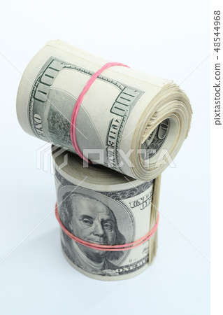 Many dollar banknotes on white background. National American currency Many dollar banknotes on white background. National American currency 48544968