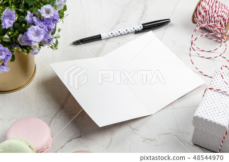 Writing a postcard Writing a postcard 48544970