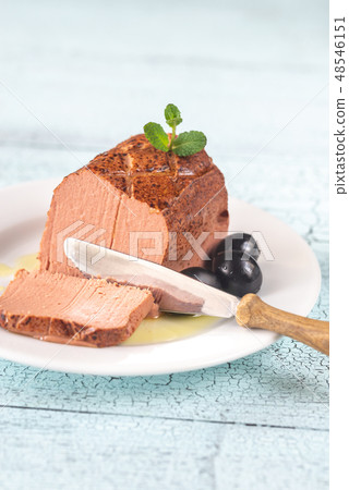 Chicken liver pate on the white plate 48546151