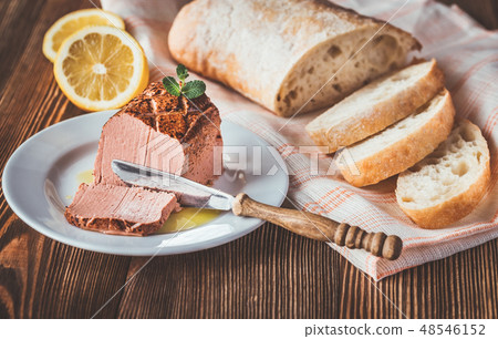 Chicken liver pate on the white plate 48546152