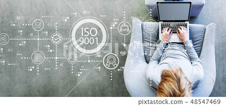 ISO 9001 with man using a laptop 48547469