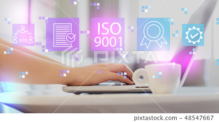 ISO 9001 with woman using a laptop ISO 9001 with woman using a laptop 48547667
