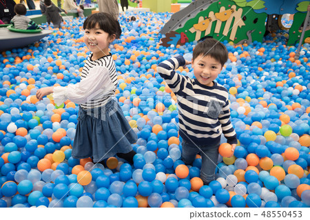 Children playing indoors Children playing indoors 48550453
