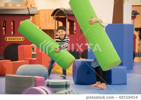 Children playing indoors Children playing indoors 48550454