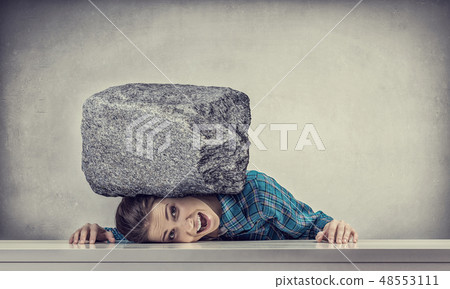 Tired girl under pressure Tired girl under pressure 48553111