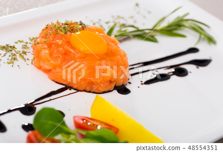 Raw salmon tartare Raw salmon tartare 48554351
