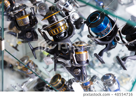 Image of stand with new good baitcasting reel Image of stand with new good baitcasting reel 48554716