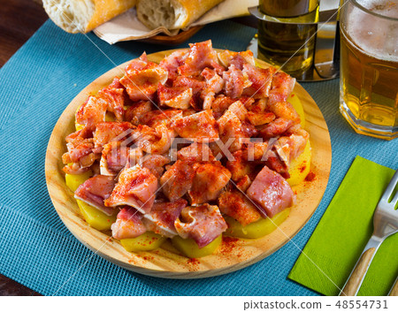 Orejas a la gallega - spanish dish. Roast pigs ears with spice 48554731
