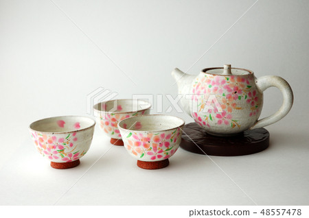 Cherry blossom teapot and sweet potato Cherry blossom teapot and sweet potato 48557478
