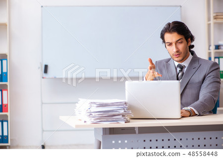Young handsome businessman employee in the office  48558448
