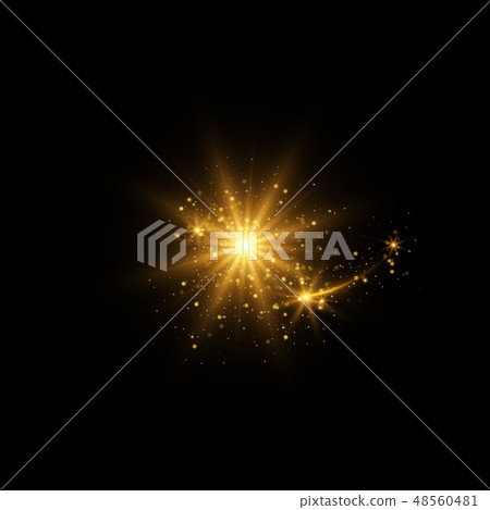 Sparkling golden magic light on black background 48560481
