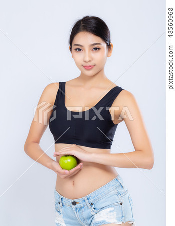Portrait asian woman holding green apple fruit Portrait asian woman holding green apple fruit 48560968