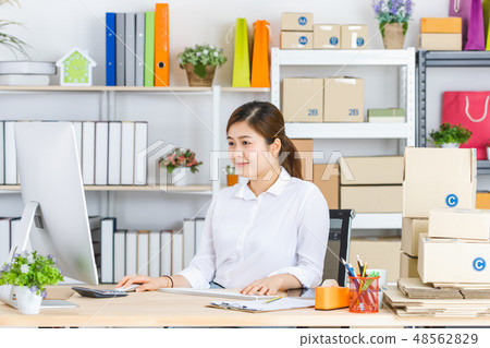 Business woman working in startup office. Business woman working in startup office. 48562829