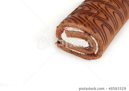 Chocolate biscuit roll cake isolated on white background. Chocolate biscuit roll cake isolated on white background. 48563329