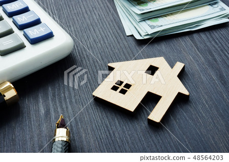 House value concept. Model of home House value concept. Model of home 48564203