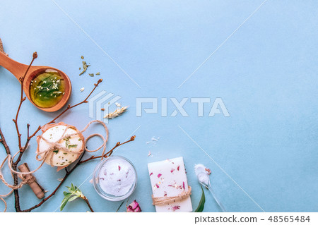 Natural handmade soap, spa organic, aromatic salt. Flat lay on a blue background Natural handmade soap, spa organic, aromatic salt. Flat lay on a blue background 48565484