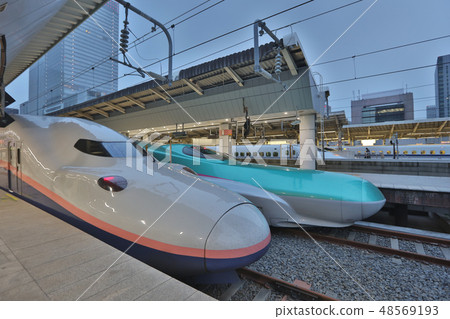 Green E5 series and white E2 series bullet trains 48569193