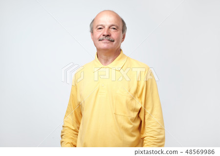 Confident hispanic mature man in shirt Confident hispanic mature man in shirt 48569986