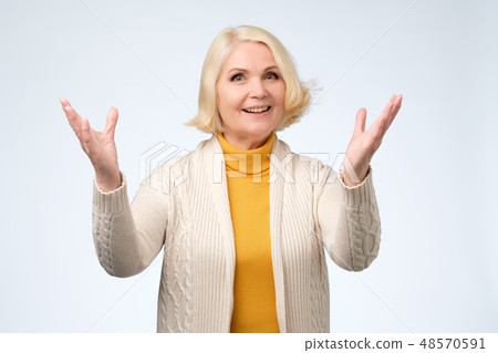 cheerful astonished lady smiling, laughing cheerful astonished lady smiling, laughing 48570591