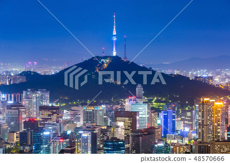 Beautiful city of lights at night. Seoul tower Beautiful city of lights at night. Seoul tower 48570666