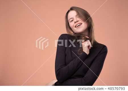 Pretty european teenager with long hairstyle. Pretty european teenager with long hairstyle. 48570793