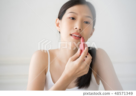 Asian female makeup beauty by lipstick Asian female makeup beauty by lipstick 48571349