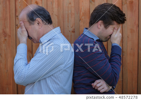 Portrait of an elderly father and son 48572278