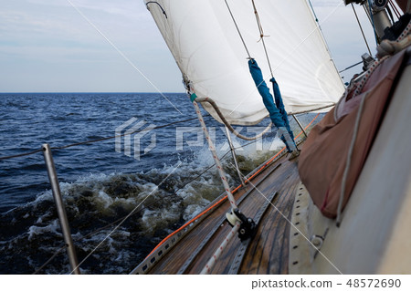 Boat bow sailing in blue Mediterranean sea Boat bow sailing in blue Mediterranean sea 48572690