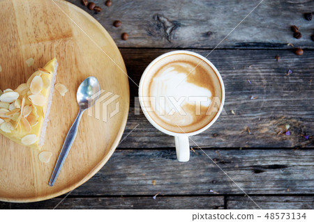 Coffee cup and cake on wooden. 48573134