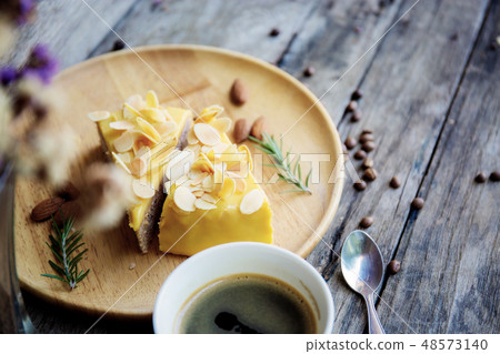 Cake and coffee on table. Cake and coffee on table. 48573140