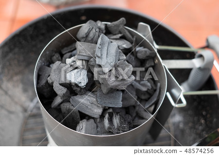 Special charbon or coal for barbecue cooking Special charbon or coal for barbecue cooking 48574256