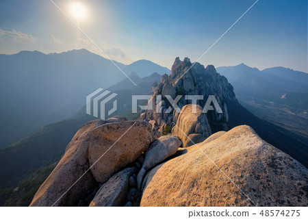 View from Ulsanbawi rock peak on sunset. Seoraksan National Park, South Corea View from Ulsanbawi rock peak on sunset. Seoraksan National Park, South Corea 48574275