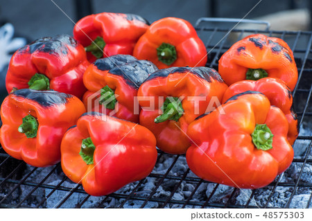 Roasted peppers on the grill 48575303