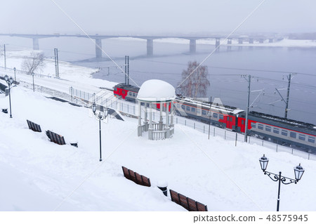 winter landscape with multiple-unit train 48575945