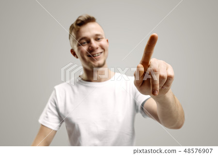 Businessman hand touching empty virtual screen 48576907