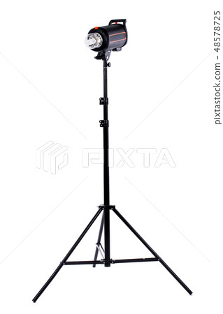A studio strobe on a light stand. A studio strobe on a light stand. 48578725