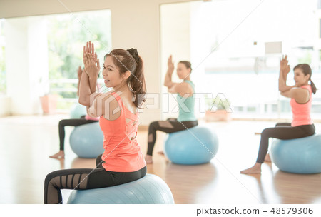 Asia women doing yoga Asia women doing yoga 48579306