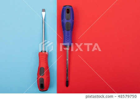 Plastic set of screw-drivers isolated on colorful background 48579750