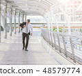 businessman in a hurry and running, he is late 48579774