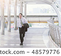 businessman in a hurry and running, he is late 48579776